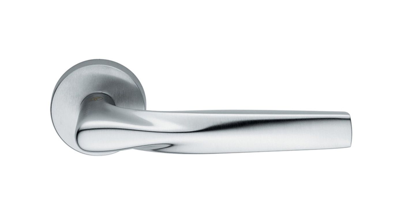 A satin-finished door lever on a round rose, seen from the side on white.