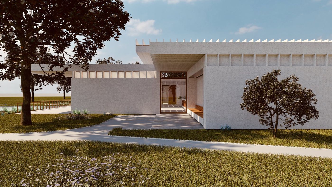 A path leads to an opening in a pale concrete wall under a deep ribbed roof.