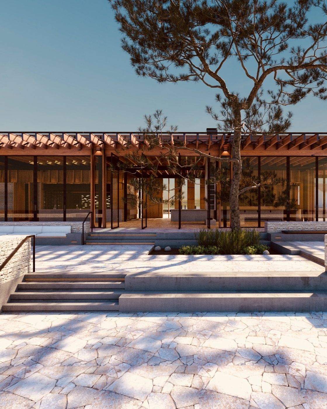 A paved court with steps and a pine tree before the timber colonnade.