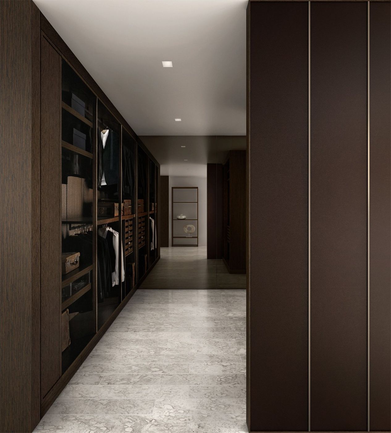 A long dark wardrobe passage lined with open shelving and hanging space.